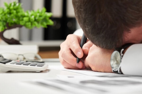 tired businessman sleeping in an office. business financial accounting concept.