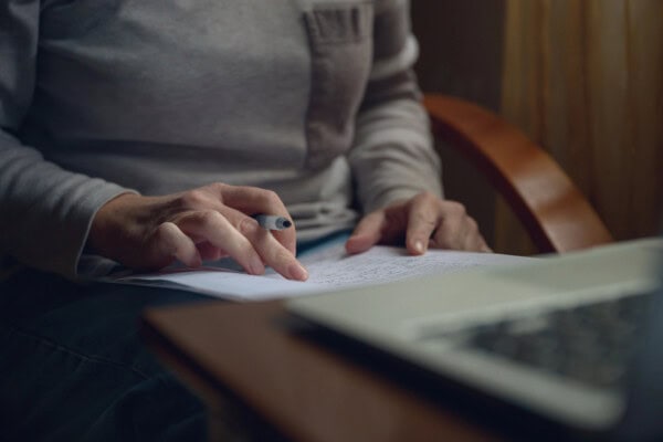 depositphotos 755266222 stock photo female freelancer doing paperwork home